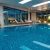 indoor-pool-private-villa-overlooking-evening-park-windows(1)_0x800