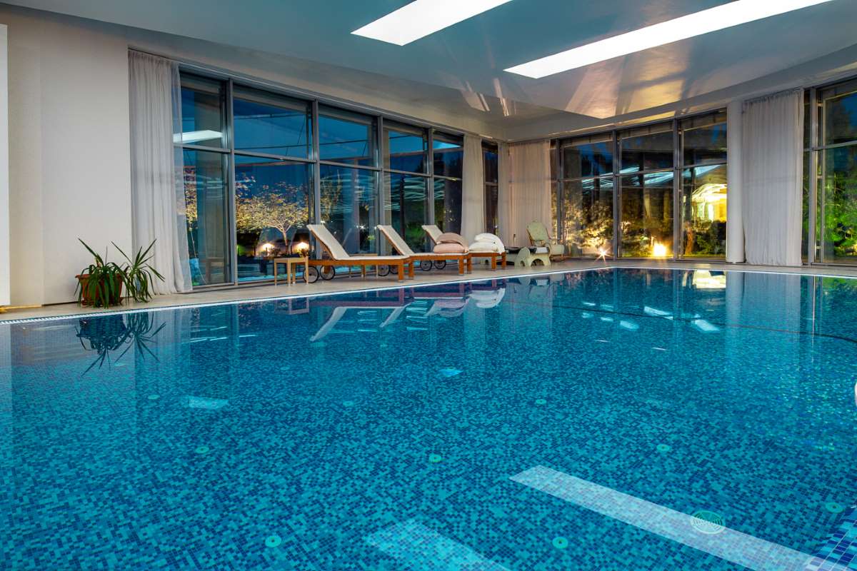 indoor-pool-private-villa-overlooking-evening-park-windows(1)_0x800 indoor-pool-private-villa-overlooking-evening-park-windows(1)_0x800