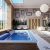 interior-pool-indoors-oriental-style-spa-complex-swimming-pool-lined-with-blue-white-ceramic-tiles-3d-rendering_0x800