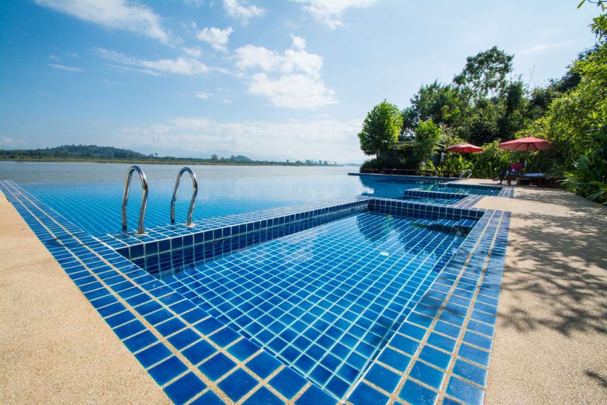swimming-pool-near-khong-river-with-blue-sky-chiangsan-chiangrai-thailand_0x800 swimming-pool-near-khong-river-with-blue-sky-chiangsan-chiangrai-thailand_0x800