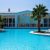 tropical-resort-with-many-palms-pool(1)_0x800