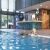 two-women-friends-enjoying-together-pool-group-females-smiling-swimming-pool_0x800