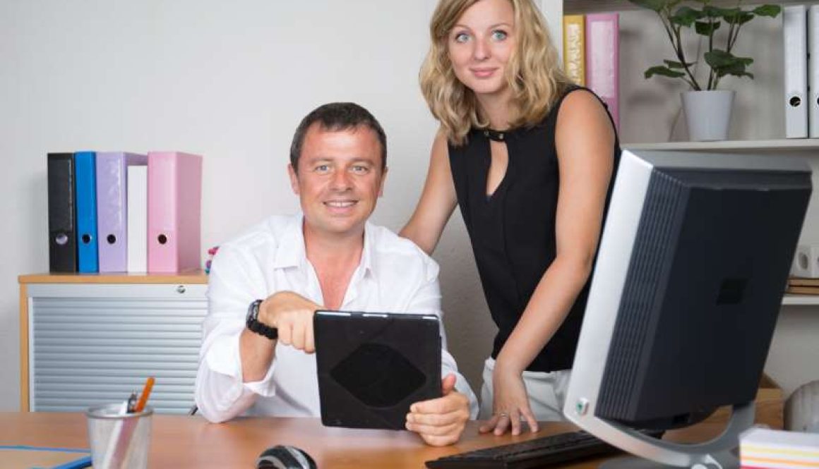 business-people-having-fun-chatting-workplace-office-with-computer-tablet_800x600