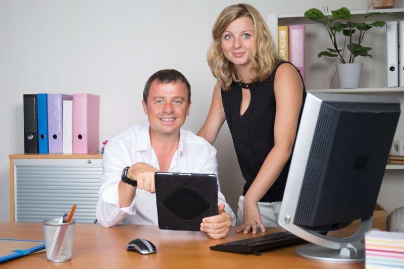 business-people-having-fun-chatting-workplace-office-with-computer-tablet_800x600