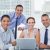 cheerful-colleagues-around-laptop-posing_800x600