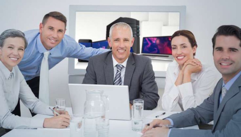 composite-image-business-team-looking-camera_800x600
