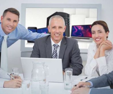 composite-image-business-team-looking-camera_800x600