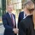 confident-business-partners-standing-near-office-buildings-shaking-hands-meeting-talking-city-contract-discussion-partnership-concept_800x600