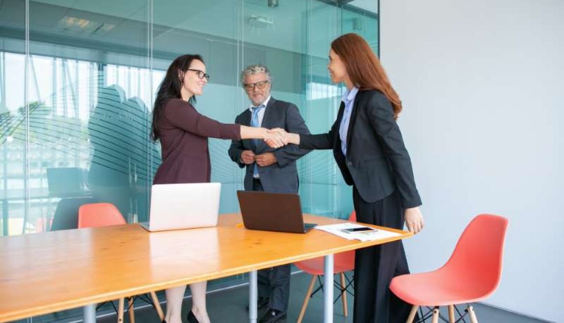 confident-businesswomen-handshaking-greeting-each-other_800x600