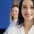 Confident people posing in company office