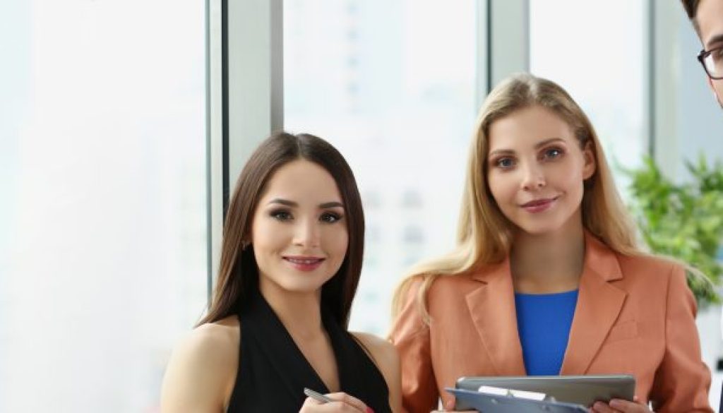 Confident team of successful people, men and women employees pose for collective picture