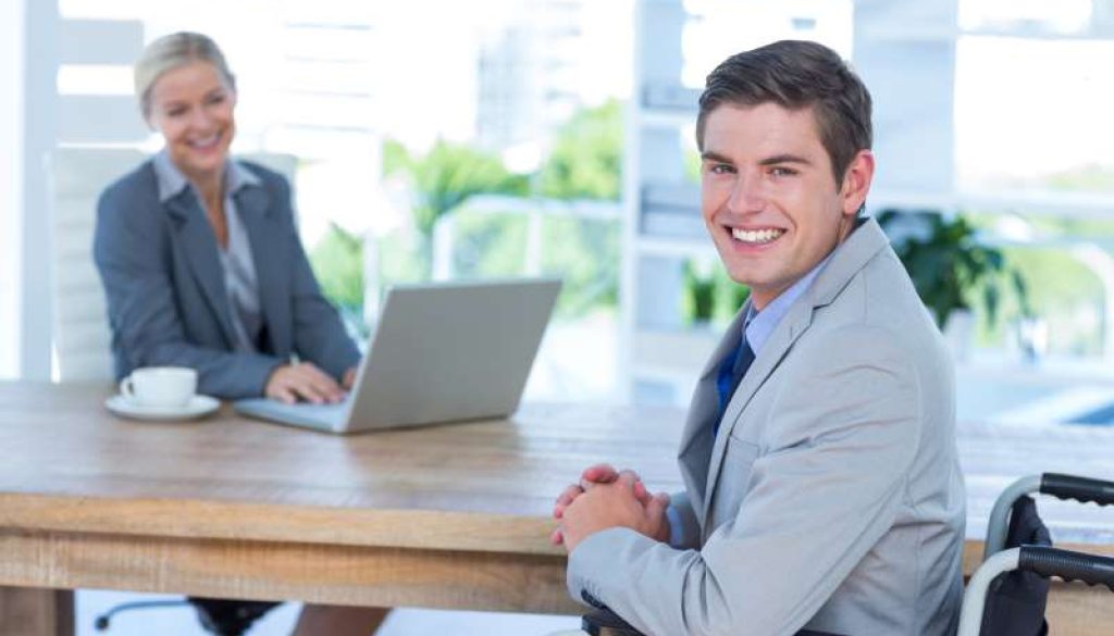 disabled-businessman-working-with-partner_800x600