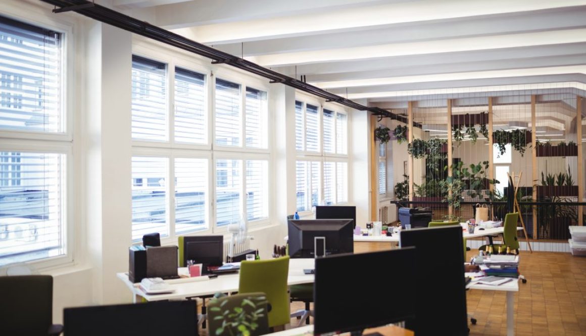 Empty office workplace with table, chair and computer