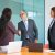 grey-haired-senior-manager-handshaking-greeting-businesswoman_800x600