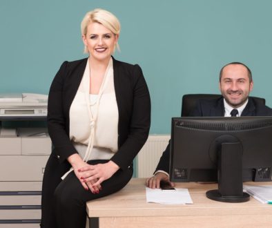 Two Business Worker Working On A Computer