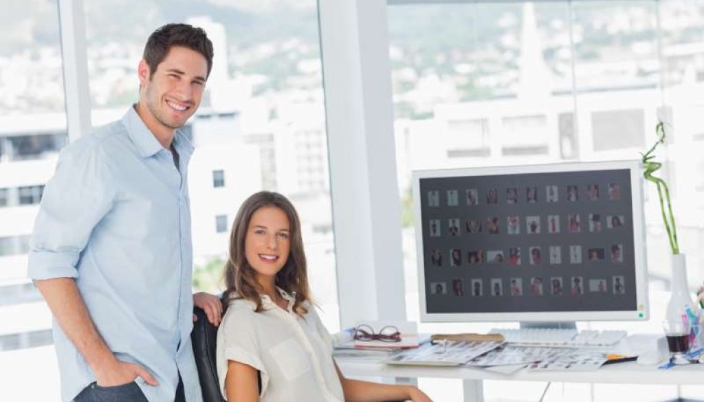 two-photo-editors-posing-their-office_800x600