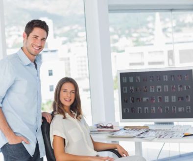 two-photo-editors-posing-their-office_800x600