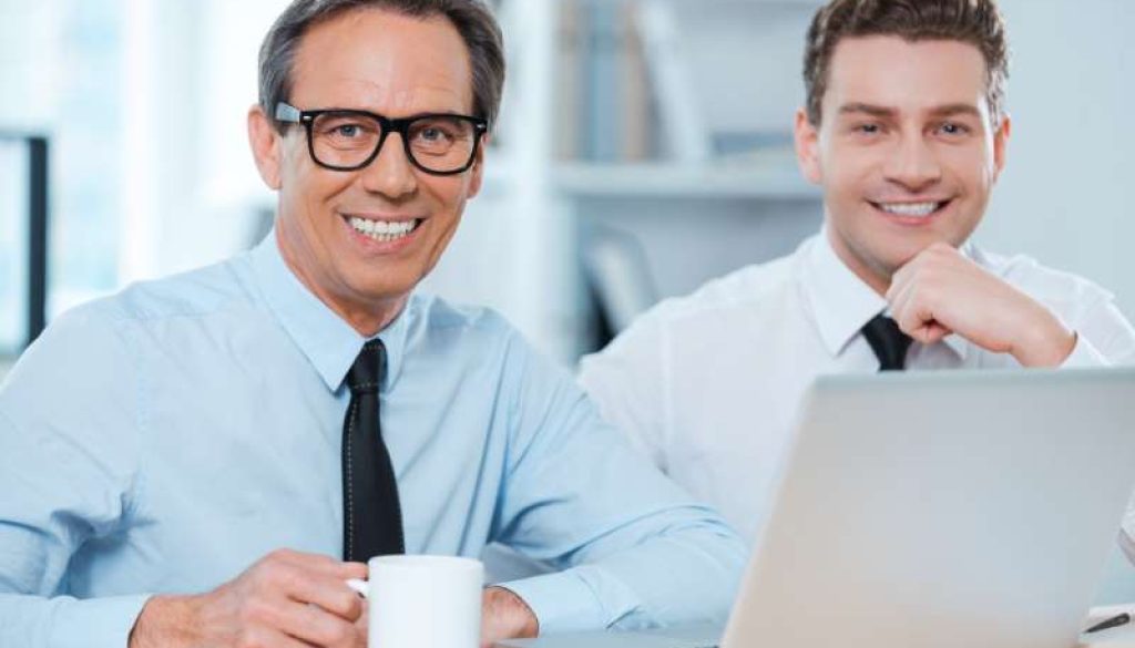 two-professionals-work-two-cheerful-business-people-formalwear-working-laptop_800x600