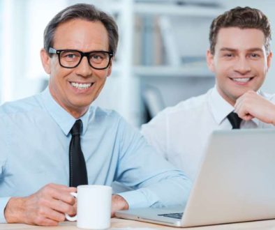 two-professionals-work-two-cheerful-business-people-formalwear-working-laptop_800x600