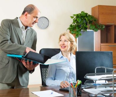 two-senior-colleagues-office_800x600