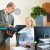 two-senior-colleagues-office_800x600